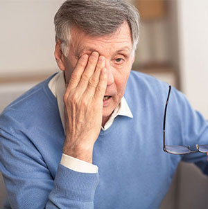 Man having a glaucoma problem